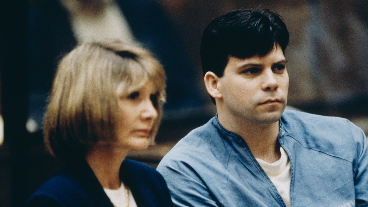 Lyle Menendez sits next to his lawyer in court in 1994