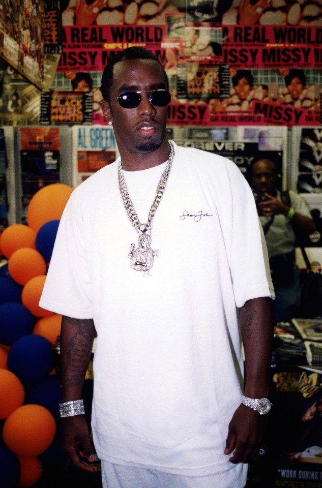 Rapper and producer Sean Combs poses for photos at George’s Music Room in Chicago, Illinois in August 1999