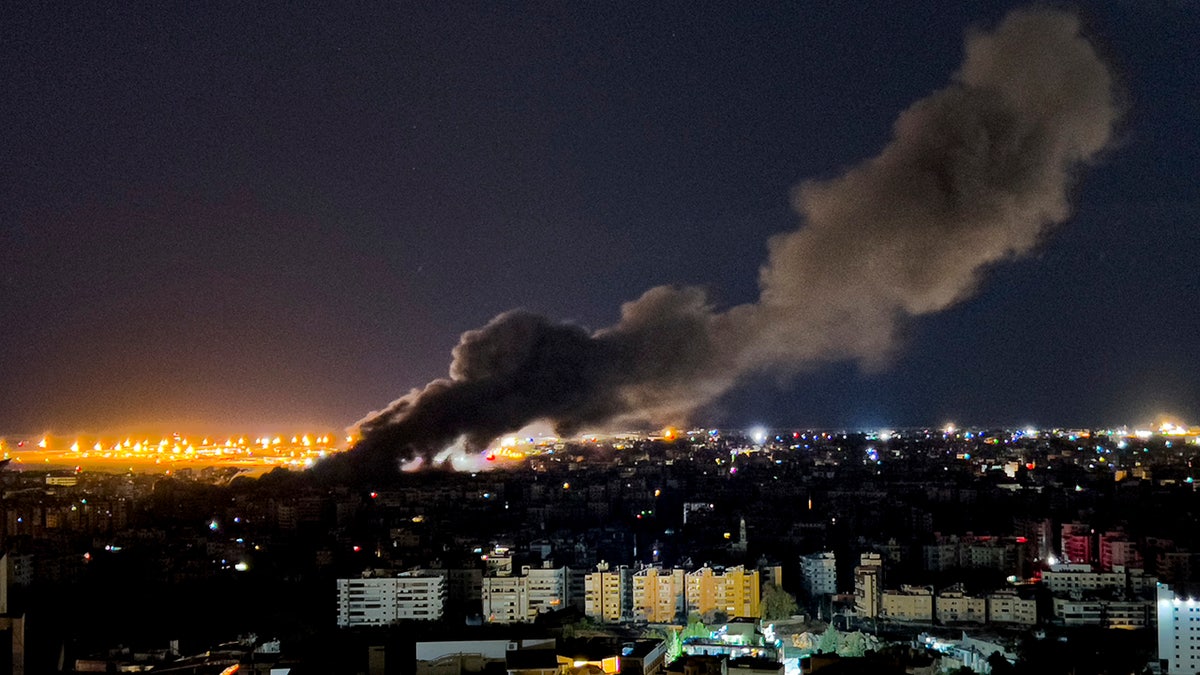 Smoke rises from an Israeli airstrike that hit the southern suburb of Beirut