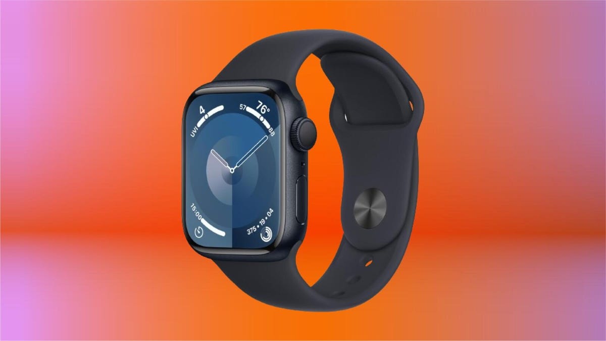 The Apple Watch 9 on display on an orange gradient background.