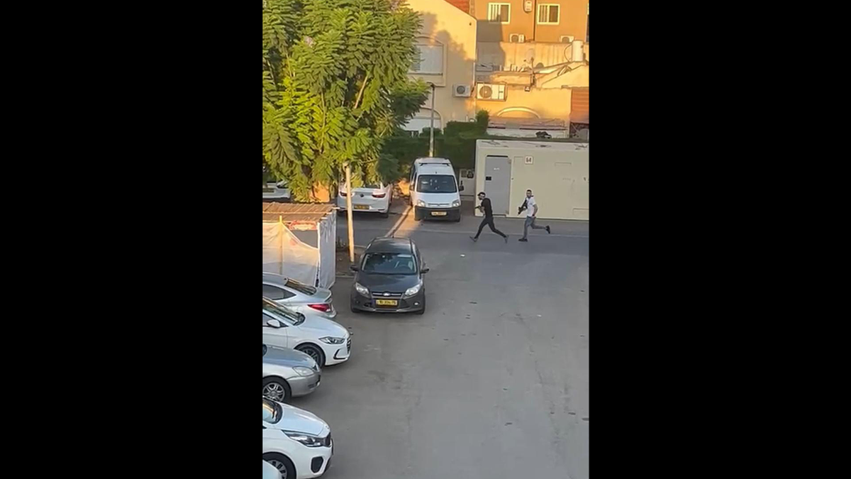 terrorists running in streets