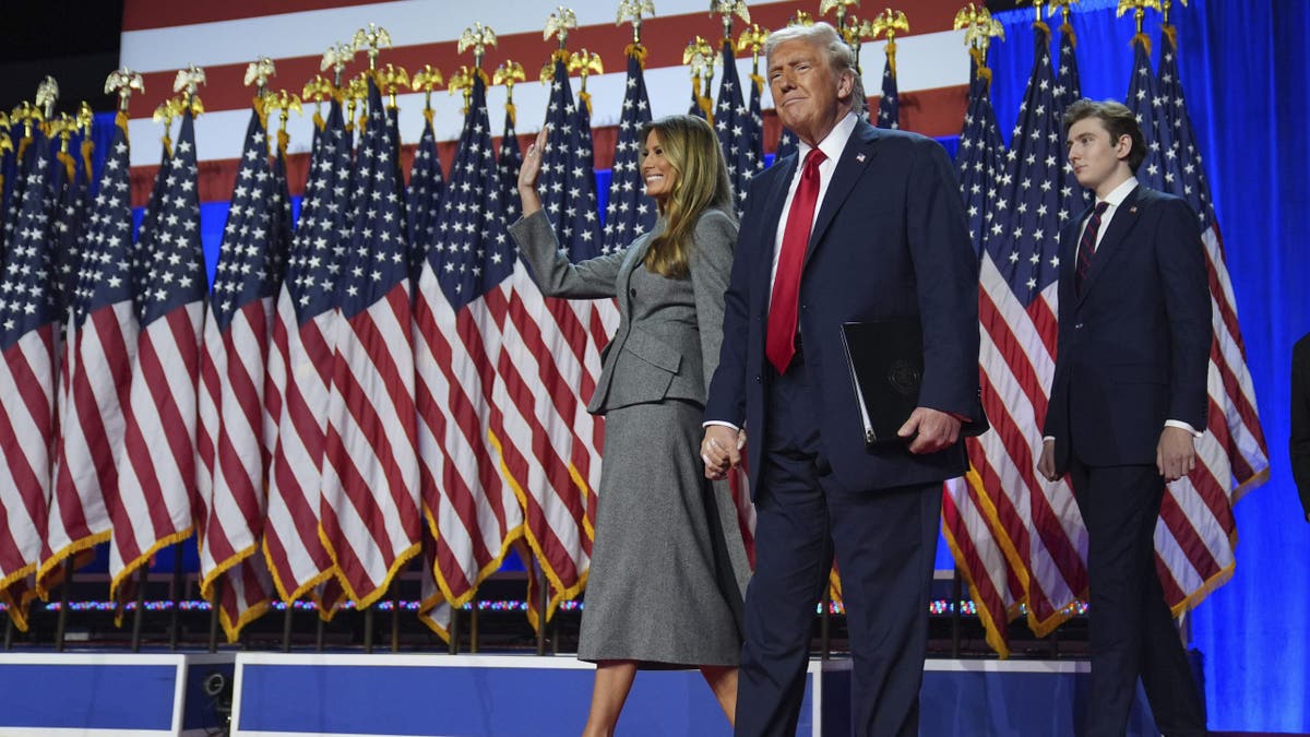 Donald and Melania Trump greet guests at Mar-a-Lago