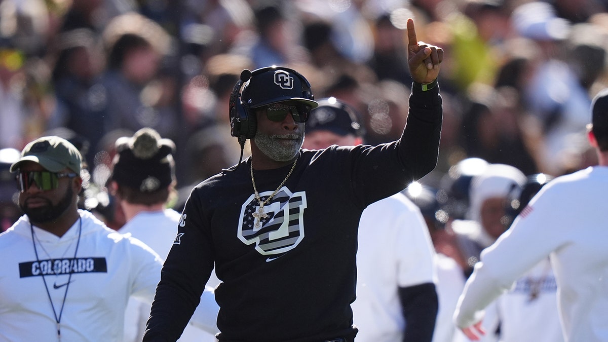 Deion Sanders looks on during a Colorado game