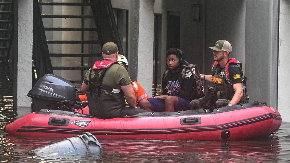 Residents are rescued from an their second story apartment complex in Clearwater that was flooded from and overflowing creek due to Hurricane Milton