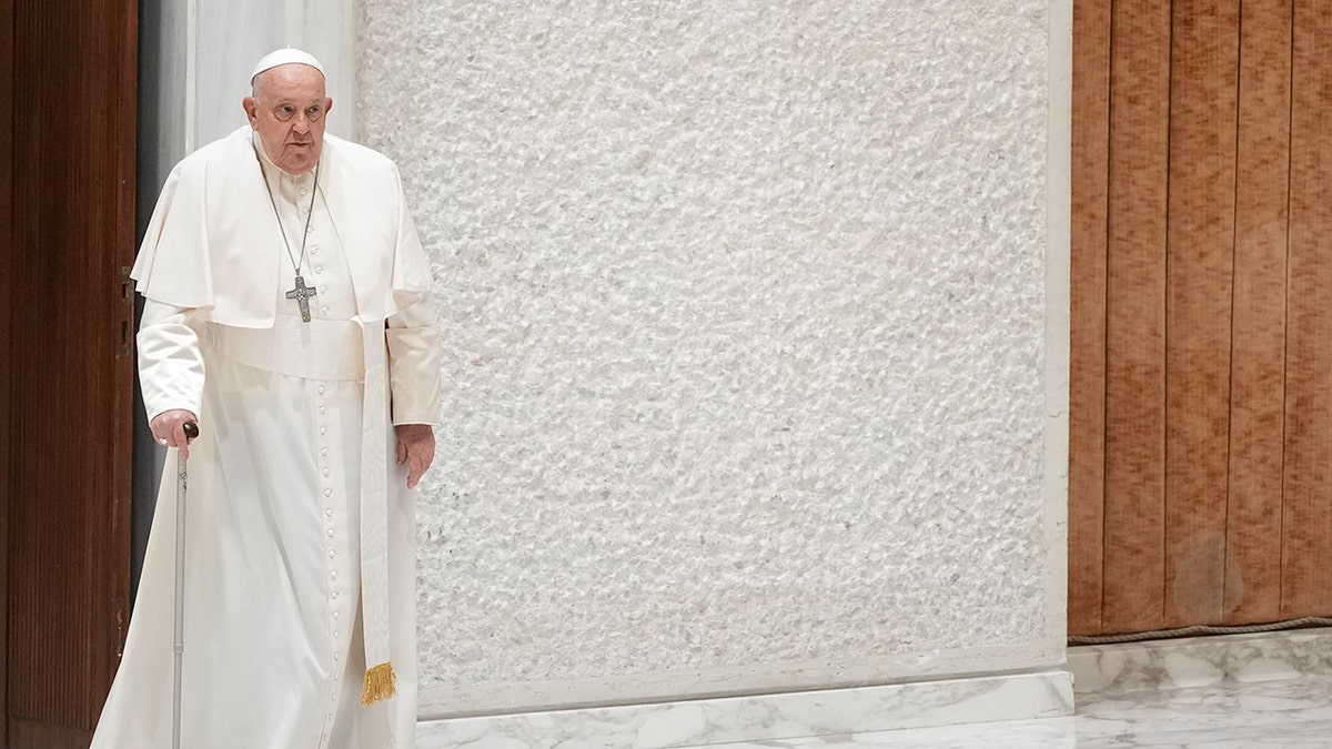 The pope walking