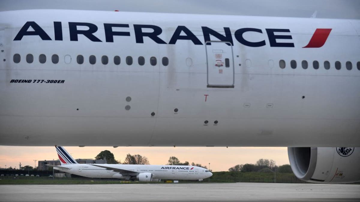 Air France planes arrive at Roissy-Charles-de-Gaulle airport in Roissy-en-France, near Paris, on April 26, 2023. (Photo by JULIEN DE ROSA / AFP) (Photo by JULIEN DE ROSA/AFP via Getty Images)