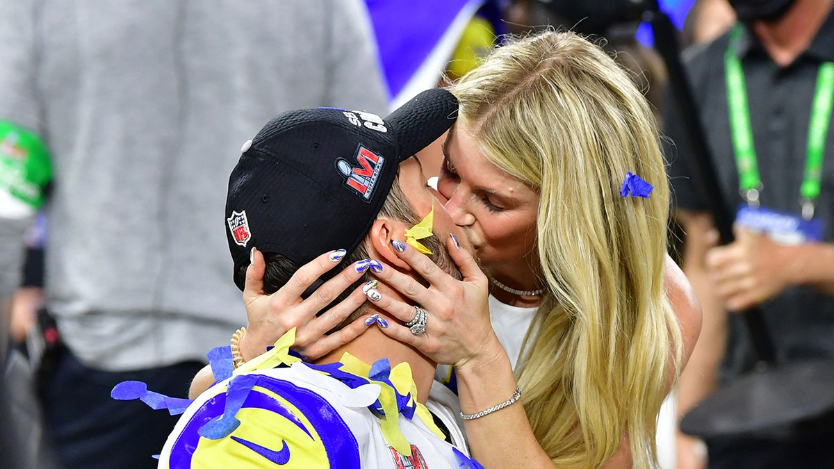 Kelly Stafford kisses Matt