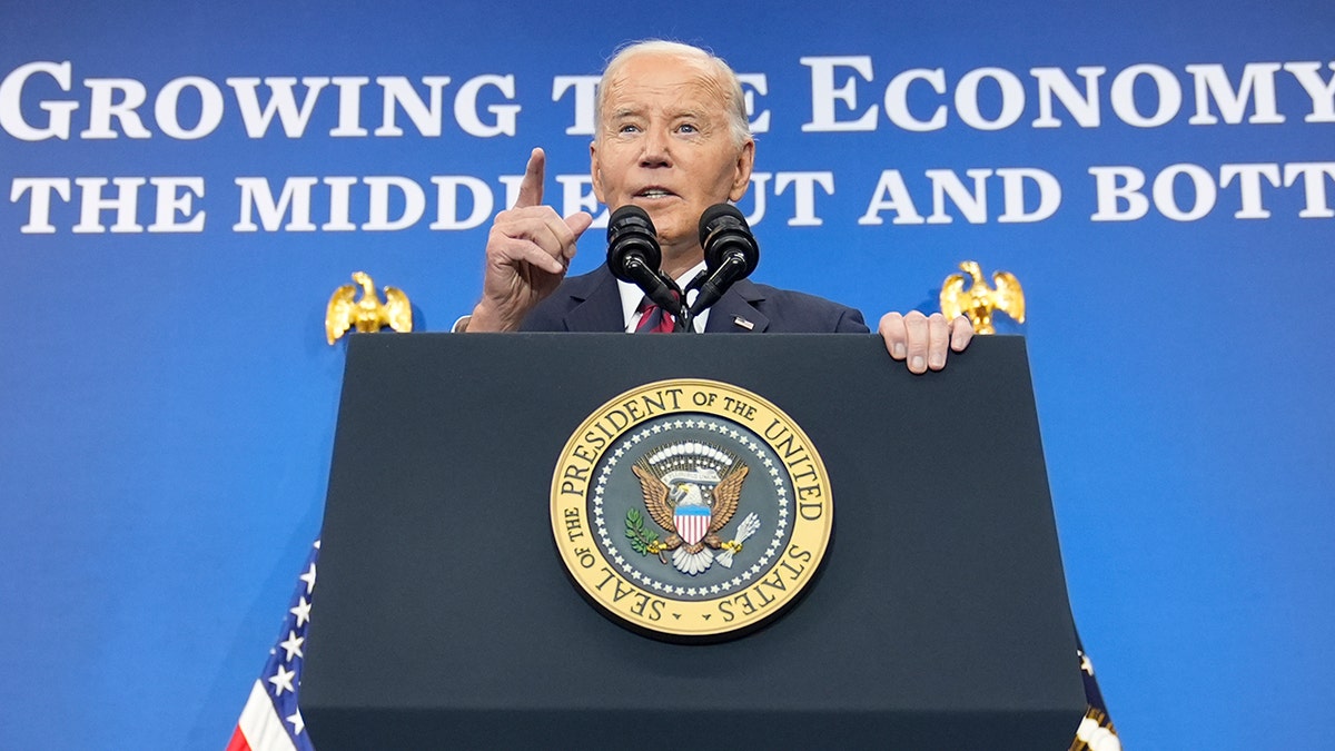 Joe Biden closeup shot at lectern, pointing