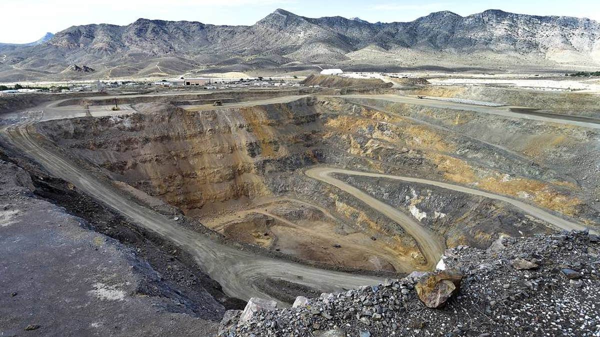 If the US wants to compete with China, we need to expand our own rare earth production. FILE: An open pit mine at Molycorp's rare-earths facility in Mountain Pass, Calif.