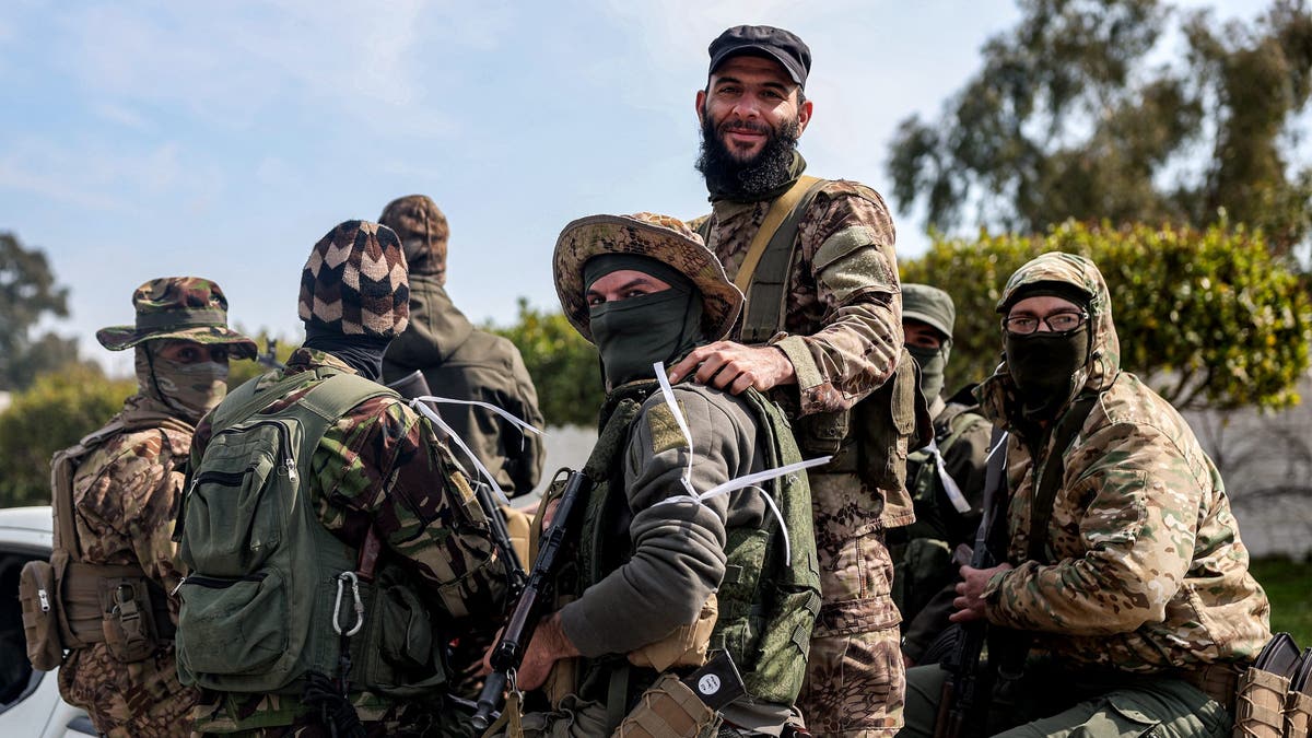 Fighters loyal to the interim Syrian government are pictured