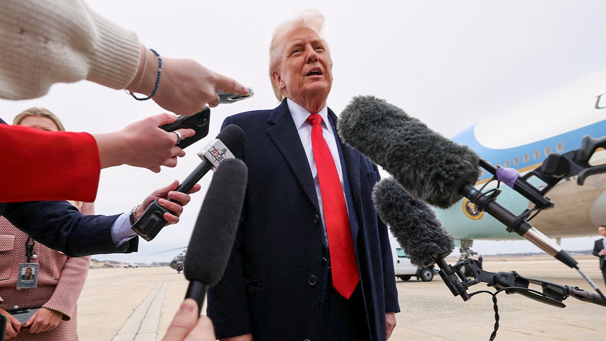 Trump speaks to reporters at Joint Base Andrews